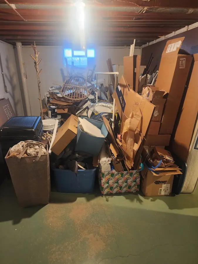 Roll-off dumpster container at job site for 2 Yard Dumpster Rental in Ballville